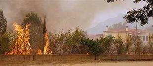 Inc�ndio atinge a regi�o da ilha da Sardegna, na It�lia
